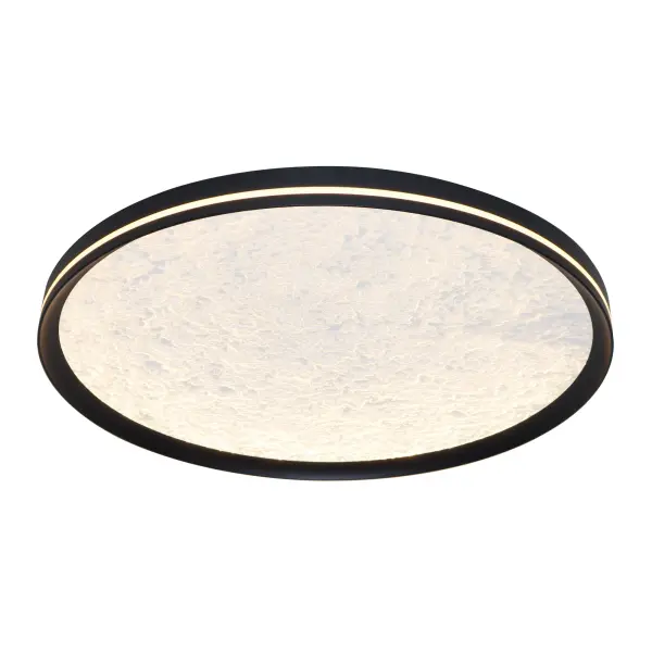 This LED flushmount from the Luna Collection is a celestial masterpiece, blending modern elegance with cosmic allure. Its black frame cradles a textured “moon crater” lens, through which a soft, glittering glow emanates, evoking the magic of starlit skies. A subtle side cutout allows ambient light to gracefully spill onto the ceiling, creating a halo-like effect that transforms any space into a serene sanctuary. The frame of this flushmount is black. - alternate view