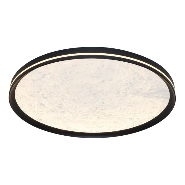 This LED flushmount from the Luna Collection is a celestial masterpiece, blending modern elegance with cosmic allure. Its black frame cradles a textured “moon crater” lens, through which a soft, glittering glow emanates, evoking the magic of starlit skies. A subtle side cutout allows ambient light to gracefully spill onto the ceiling, creating a halo-like effect that transforms any space into a serene sanctuary. The frame of this flushmount is black. - alternate view