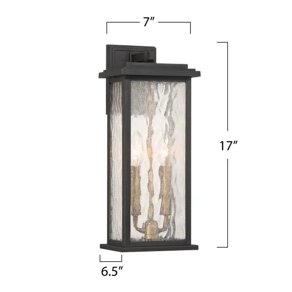 Brass with Rain Glassware The “Estate” Collection outdoor wall sconce radiates classic allure, with its black metal frame offering a striking contrast to the mesmerizing water glass panels. Encased within, vintage brass candle covers and intricate metalwork glow warmly, evoking a sense of nostalgic charm. Perfect for enhancing any outdoor space, this sconce blends classic sophistication with modern durability.