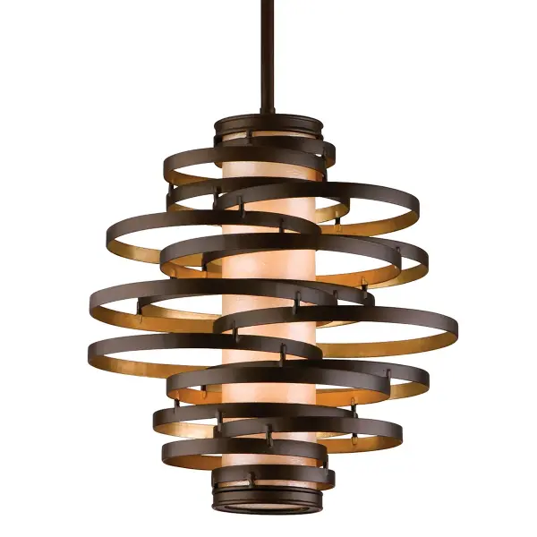 The Vertigo pendant transforms any space with its tornado-like silhouette of handcrafted circular metal rings. The Bronze Leaf finish with Caramel Ice glass creates warmth and visual intrigue at an accessible 18-inch scale.
