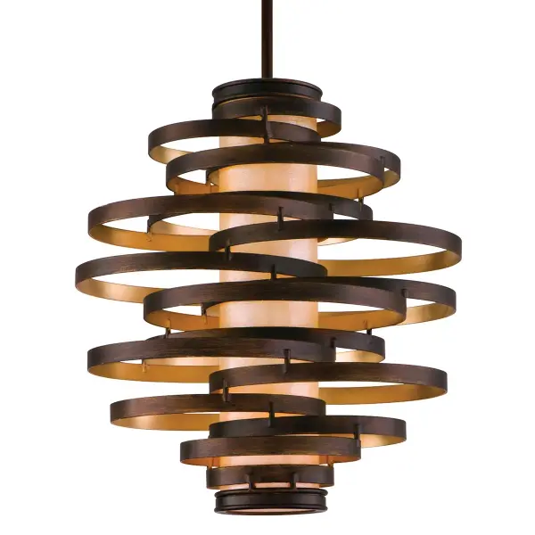 The Vertigo chandelier combines hand-crafted iron with a distinctive bronze and gold leaf finish, creating a sculptural focal point. Its compact 23-inch profile and warm caramel ice glass make it versatile for both residential and hospitality settings.