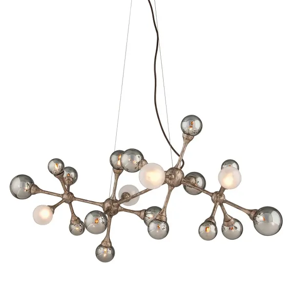 The Element Linear Chandelier combines contemporary design with luxurious hand-crafted details. Its 47-inch length and integrated LED technology make it ideal for modern dining spaces and kitchen islands seeking dramatic illumination.