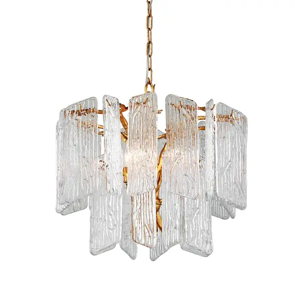 The Piemonte chandelier brings Old World elegance with its hand-crafted iron construction and lustrous gold leaf finish. At 24 inches wide, it's perfectly proportioned for medium dining rooms and foyers, offering timeless sophistication.