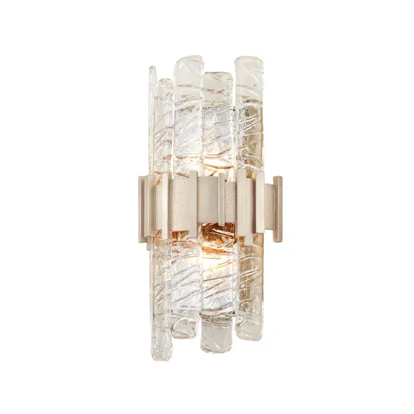 The Ciro wall sconce combines handcrafted iron construction with an antique silver leaf finish for sophisticated ambient lighting. Its compact 8.5-inch profile and clear glass shades make it ideal for bathrooms, hallways, and powder rooms.