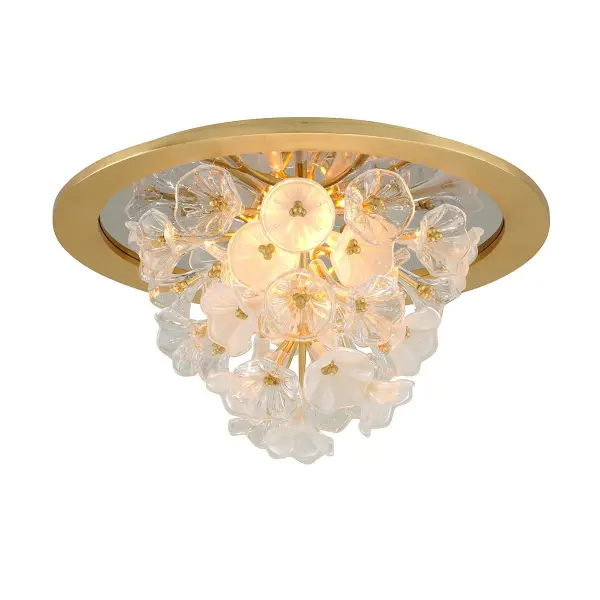 The Jasmine flush mount brings sophisticated warmth with its hand-crafted iron construction and gold leaf finish. At 21.75 inches wide, it provides ample illumination while maintaining a low 12.25-inch profile ideal for standard ceiling heights.