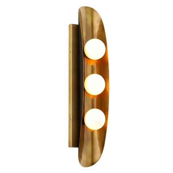 The Hopper LED Wall Sconce combines mid-century modernism with organic forms through its distinctive brass leaf design. The vintage brass finish contrasts beautifully with natural black patina on the reverse, creating visual depth. Three integrated LED modules behind opal white glass provide warm, diffused illumination perfect for hallways and intimate spaces.