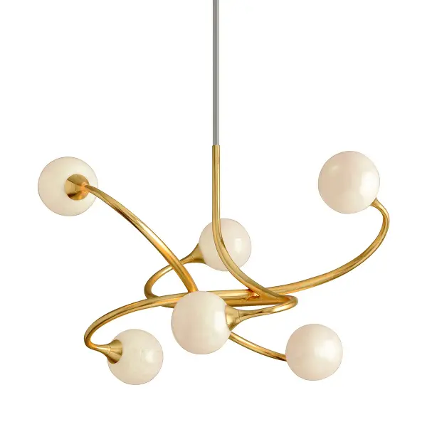 The Signature chandelier combines fluid, hand-crafted iron arms with pearl-like white glass shades in an antique Gold Leaf finish. Its organic silhouette and artisanal details bring warmth and sophistication to contemporary spaces.