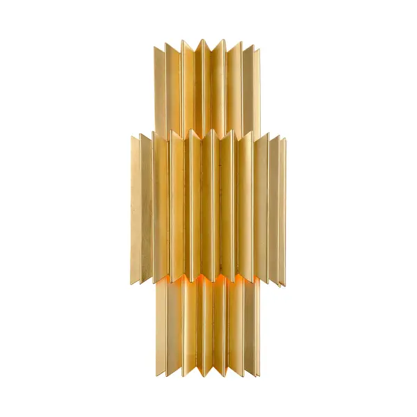 The Moxy wall sconce brings sophisticated glamour with its hand-crafted iron construction and luxurious gold leaf finish. Its compact 9.5-inch width makes it ideal for flanking mirrors or creating symmetrical lighting arrangements.