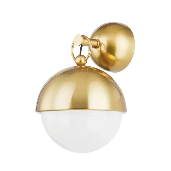The Althea wall sconce brings refined sophistication with its jewelry-inspired design. The cloud glass globe paired with vintage polished brass creates a warm, luxurious glow perfect for intimate spaces.