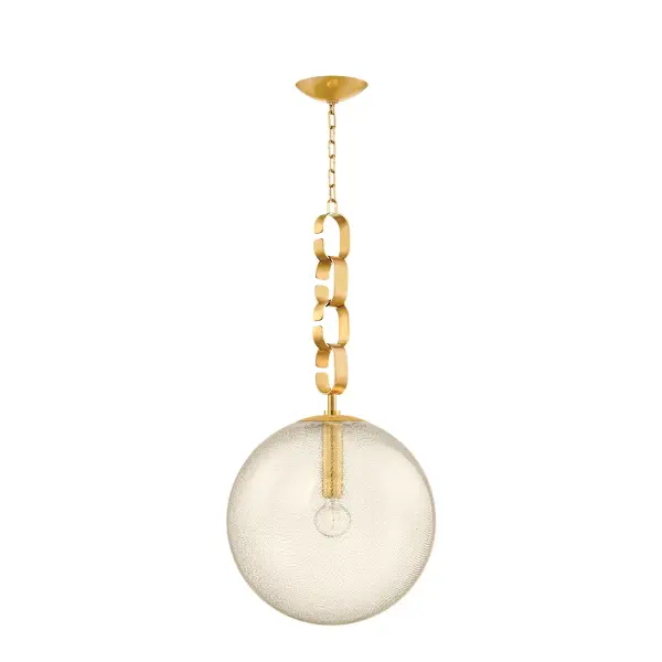 The Nessa pendant captures Art Deco opulence with its swirled seeded glass orb and chunky vintage brass chain. Perfect for adding warmth and decorative flair to intimate dining spaces or entryways.