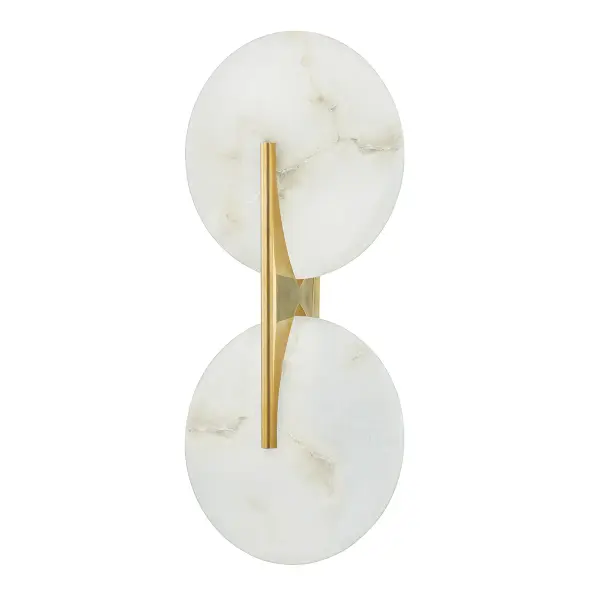 The Asteria LED Wall Sconce combines natural alabaster discs with vintage brass metalwork for a sophisticated, moon-like glow. Its ADA-compliant design and damp rating make it ideal for bathrooms and hallways.