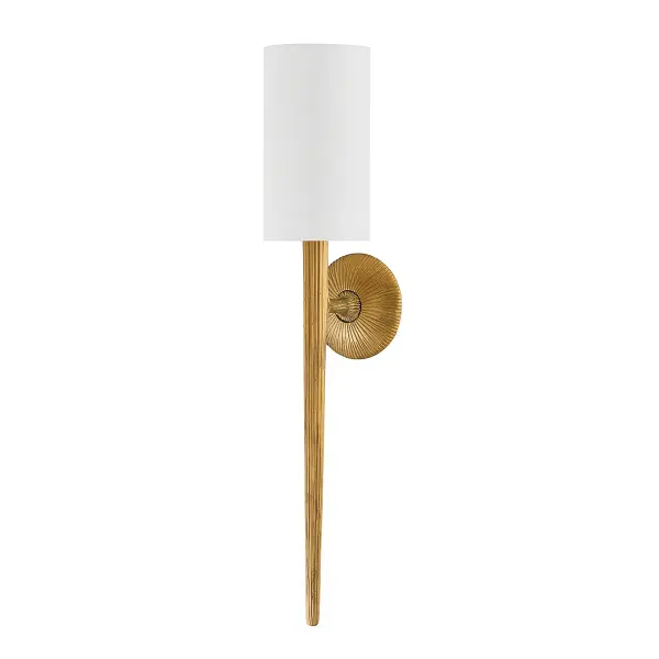 The Anthia sconce elevates the classic long-arm silhouette with textured Vintage Brass metalwork that adds architectural depth. The white linen drum shade provides soft, diffused light and creates elegant contrast against the tapered brass arm.