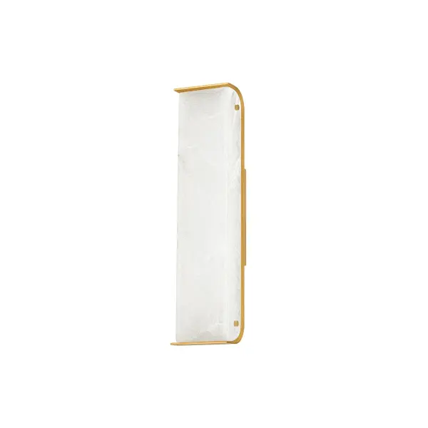 The Hera wall sconce brings Greek-inspired grandeur to modern spaces with its thick alabaster stone slab framed in warm Vintage Brass. Natural veining creates unique character in each piece, while integrated LED provides efficient, warm illumination.