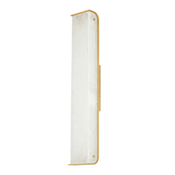 Greek-inspired wall sconce featuring thick alabaster stone within a vintage brass frame. The natural veining creates unique lighting effects, making each piece one-of-a-kind. ADA compliant and ideal for upscale residential and hospitality settings.