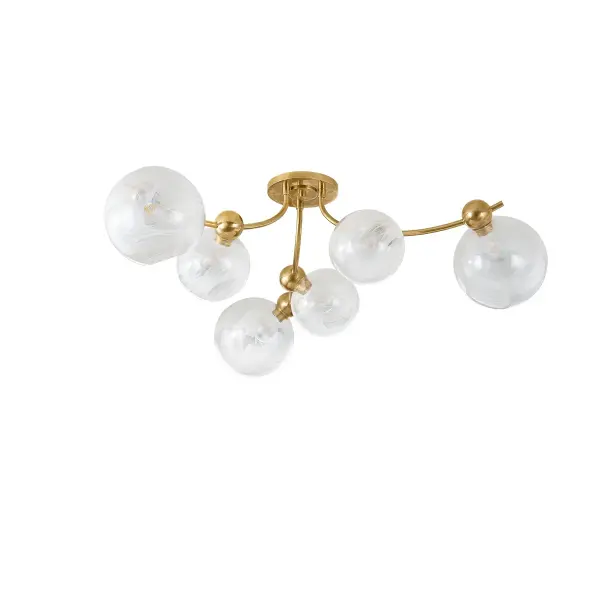 The Astraia brings celestial elegance to spaces with lower ceilings. Its 54-inch span and swooping brass stems create dramatic visual interest while the handblown Remolino Blanco glass globes add artisanal warmth. Perfect for modern interiors seeking statement lighting without pendant drop.