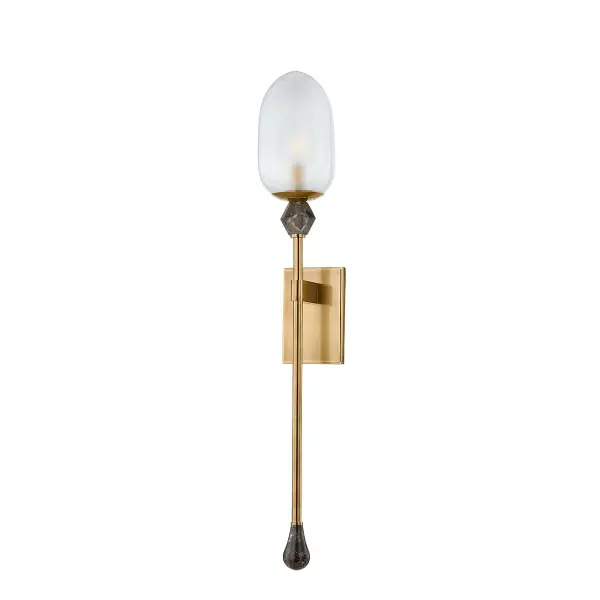 The Daith sconce showcases Noz Nozawa's signature design aesthetic with its sugarloaf-inspired etched glass shade suspended on decorative mariner chain. The thick, clear etched glass creates beautiful light diffusion while the vintage brass finish adds warmth.