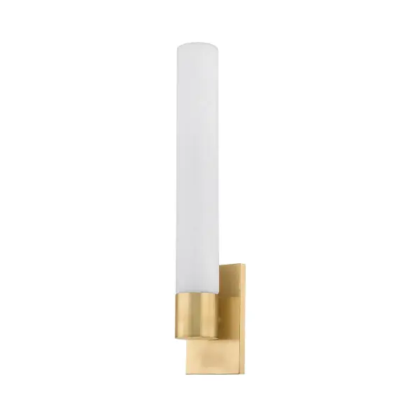 The Balerma LED Wall Sconce combines sophisticated design with energy-efficient LED technology. Its matte cloud glass reveals intricate veining when illuminated, while vintage brass cuffs and backplate add warmth and luxury.