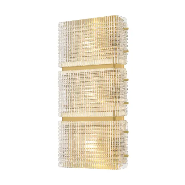 The Mav sconce reimagines vintage glass block aesthetics with modern sophistication. Its textured piastre glass creates stunning light refraction, while the compact profile makes it ideal for smaller spaces needing visual impact.