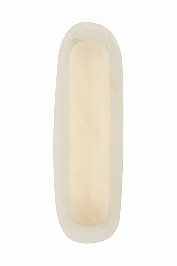 The Kopan sconce by designer Noz Nozawa transforms simple forms into sophisticated lighting art. Cloud glass paired with milky alabaster creates atmospheric warmth, while the vintage brass finish adds timeless elegance to modern and transitional spaces.