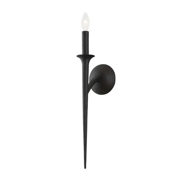 The Luca wall sconce combines minimalist elegance with architectural intrigue. Its slender tapered stem extends at an angle from the round backplate, creating dimensional visual interest that reveals itself in profile.