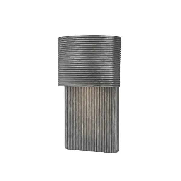 The Tempe outdoor wall sconce combines striking modern design with practical outdoor performance. Its ribbed aluminum frame creates visual interest while casting soft, indirect light. Wet rated and dark sky compliant.