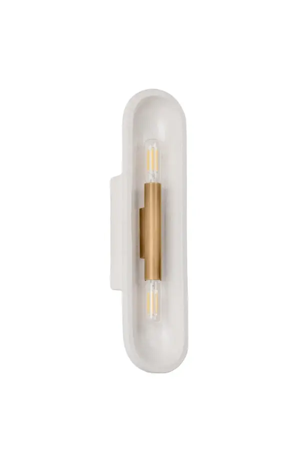 The Lane sconce combines industrial warmth with artisanal craftsmanship. Its white crackle-glazed ceramic reflector and patina brass metalwork create a sophisticated vintage aesthetic perfect for modern and transitional spaces.