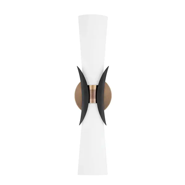 The Muncie wall sconce combines warm Patina Brass with contrasting Soft Black accents in a distinctive hourglass silhouette. Its opal etched glass provides soft, diffused light perfect for intimate spaces.