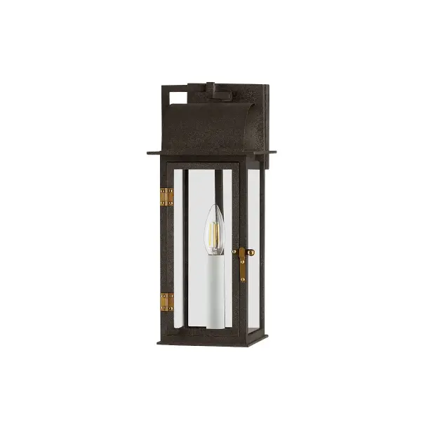The Bohen wall sconce reimagines early American gas lanterns with clean lines and rustic elegance. Its French Iron finish with Patina Brass accents brings timeless character to traditional homes while meeting modern outdoor lighting needs.