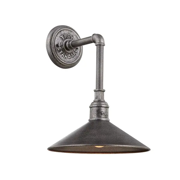 The Toledo wall lantern combines traditional styling with modern durability. Hand-crafted iron and aluminum construction with Old Silver finish provides weather resistance and timeless appeal for exterior spaces.