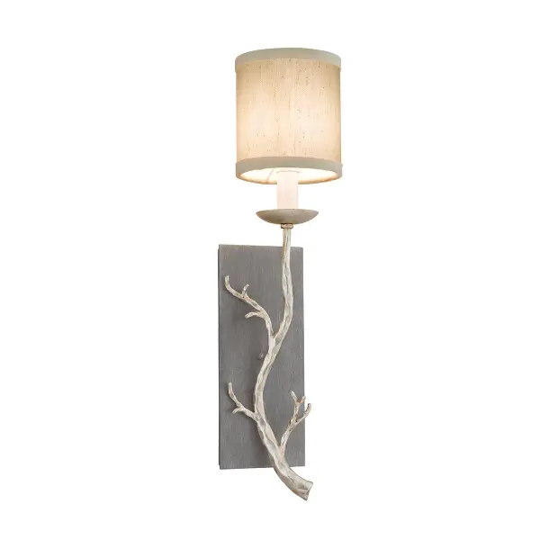 The Adirondack wall sconce brings artisanal craftsmanship to any space with hand-worked iron in a rich graphite finish. Its compact profile and warm beige glass make it ideal for hallways, bathrooms, and entryways.