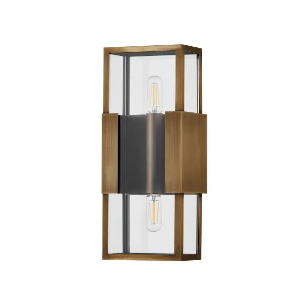 The Santa Clara wall sconce beautifully balances vintage charm with contemporary minimalism. Its transparent glass box design maximizes light output while the patina brass metalwork adds warmth and character to any exterior space.