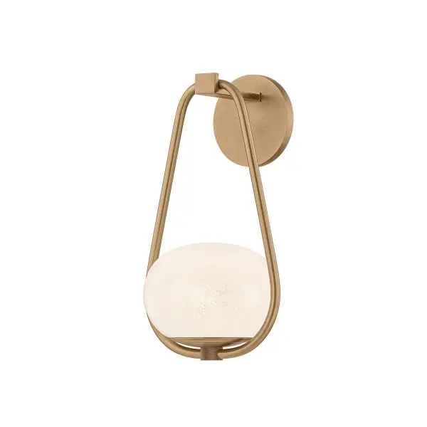 The Decker LED sconce brings an artistic, jewelry-inspired design with its distinctive racetrack link and organic seeded glass shade. The patina brass finish adds vintage warmth, while the compact 8-inch width makes it ideal for smaller spaces.