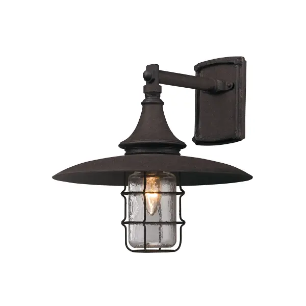 The Allegheny wall lantern combines traditional craftsmanship with modern durability. Hand-forged iron construction and clear glass create a warm, welcoming glow perfect for exterior spaces. Wet-rated for all-weather performance.