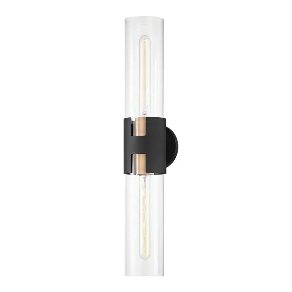 The Amado sconce combines contemporary styling with practical functionality. Its vertical design with up/down lighting makes it ideal for bathrooms while remaining versatile enough for hallways and bedrooms. The mixed-metal finish adds visual interest.