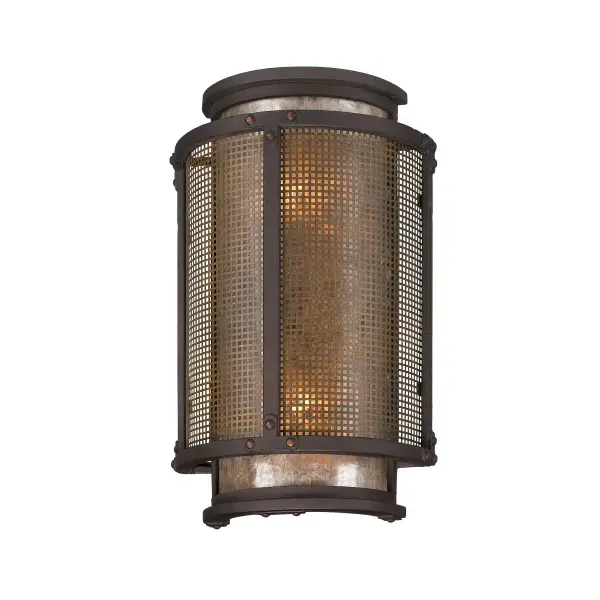 This compact outdoor wall lantern combines hand-worked iron craftsmanship with warm silver mica glass, creating an inviting glow perfect for traditional and rustic exteriors. Wet-rated for all-weather durability.