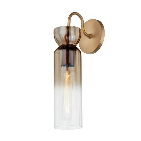 The Julian sconce combines modern elegance with artistic glass work. Its champagne-to-clear ombre glass creates a sophisticated visual that enhances any space, while the patina brass finish adds warmth and timeless appeal.