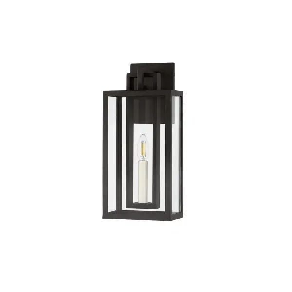 The Amire sconce delivers modern elegance through its layered rectangular frame and negative space design. Clear glass panels maximize light output while the textured black aluminum finish provides weather resistance.