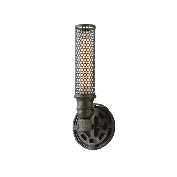 The Atlas wall sconce brings industrial charm to compact spaces with hand-worked iron construction and aged pewter finish. Its slim 5-inch profile makes it ideal for narrow hallways and powder rooms while providing focused task lighting.