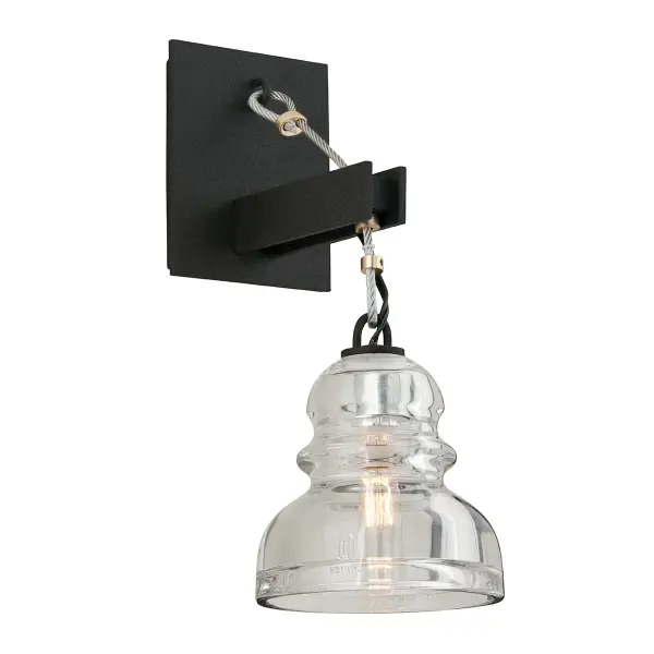 The Menlo Park wall sconce delivers authentic industrial style with hand-worked iron and clear glass. Its compact 5.75" profile makes it ideal for tight spaces while the textured iron finish adds character to any room.