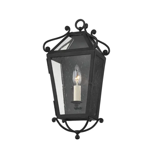 Designer Mark D. Sikes brings coastal California glamour to this wet-rated wall sconce. Decorative scrollwork and dramatic scale deliver classic Spanish colonial style with modern durability.
