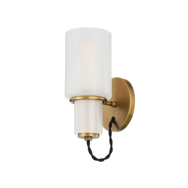 The Lincoln sconce blends vintage charm with contemporary design through its clear etched glass shade and distinctive braided black cord detail. Compact yet impactful, it delivers character to smaller spaces.