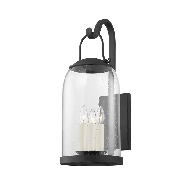 The Napa County wall sconce by designer Mark D. Sikes brings European elegance to outdoor spaces with its seamless curves, oversized dome, and clear seedy glass. Wet-rated for durability and designed to evoke candlelit ambiance.