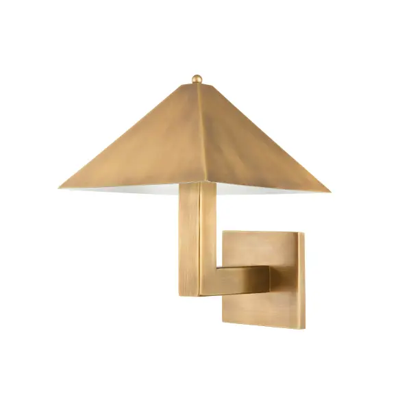The Knight sconce delivers bold industrial style through its pyramid-shaped metal shade and architectural square arm design. The patina brass finish adds warmth while maintaining the fixture's modern edge.