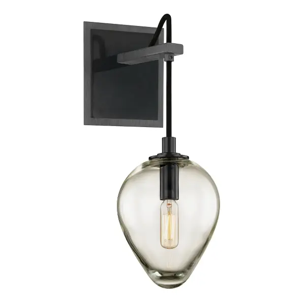 The Brixton wall sconce brings industrial charm to smaller spaces with its hand-worked iron construction and graphite finish. Clear glass shade provides functional task lighting while the compact 5.75" profile works in tight spaces.