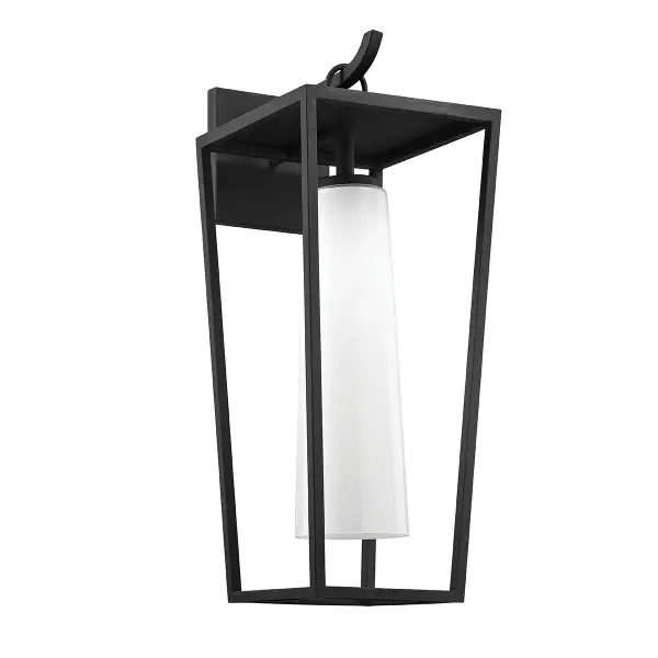 The Mission Beach wall lantern combines coastal charm with contemporary durability. Hand-worked iron construction in textured black finish pairs with opal glossy glass for soft, welcoming illumination. Wet-rated for exposed outdoor locations.