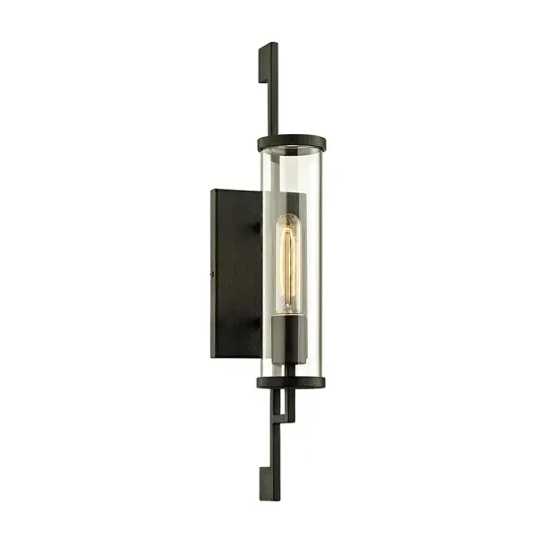 The Park Slope wall sconce combines hand-worked iron craftsmanship with practical outdoor durability. Its compact 4.5-inch profile and 21-inch height make it ideal for flanking doorways or illuminating narrow exterior spaces.