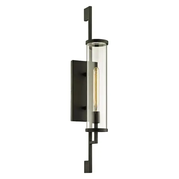 The Park Slope wall sconce brings industrial charm to outdoor spaces with hand-worked forged iron and clear glass. At 32 inches tall, it makes a dramatic statement on porches, patios, and entryways while providing ample illumination.