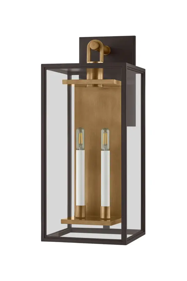 The Arnold sconce combines traditional lantern styling with modern geometric lines and a striking mixed metal finish. Built with corrosion-resistant EPM material, it's engineered for long-term outdoor durability.