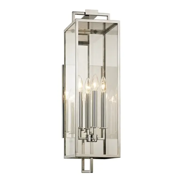 The Beckham wall lantern combines classic box lantern design with a sleek, elongated modern silhouette. Its polished stainless steel finish and four-light configuration make it ideal for large-scale homes seeking sophisticated outdoor lighting.