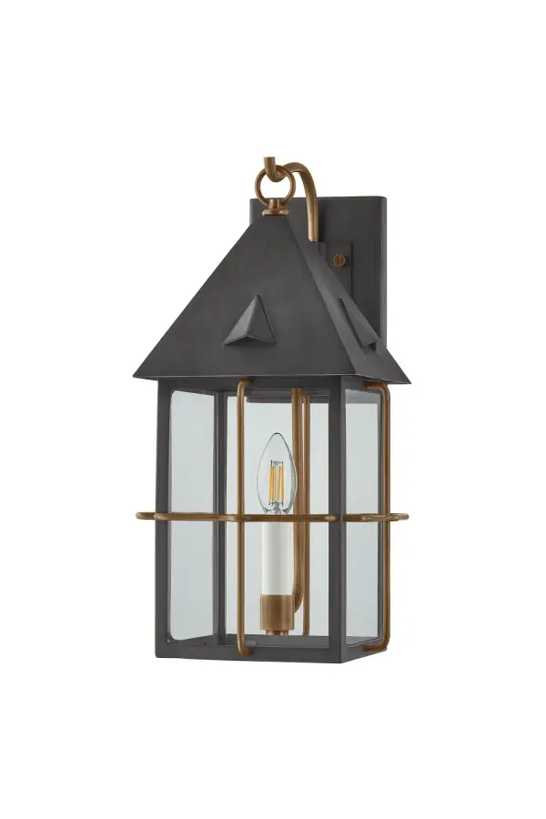 This heritage-inspired sconce beautifully updates the traditional post lantern with contemporary finishes. The warm Patina Brass accents against Graphite framing create visual interest while maintaining coastal authenticity.